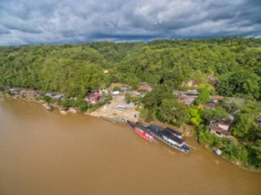 An aerial view of Puerto Arango, a port at the shore of the Orteguaza river in Caqueta, Colombia.
